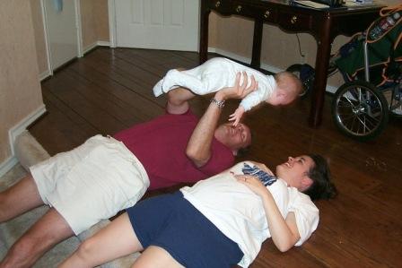 Al, Kelsi and Mom. . . . pulling a Superman.