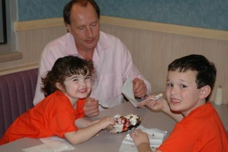 Kelsi, Uncle and Kevin enjoying dessert at Braum's . . . their favorite before, during and after dinner hangout they frequented.