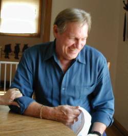 Mike, April 2003, laughing at grandaughter Sydney