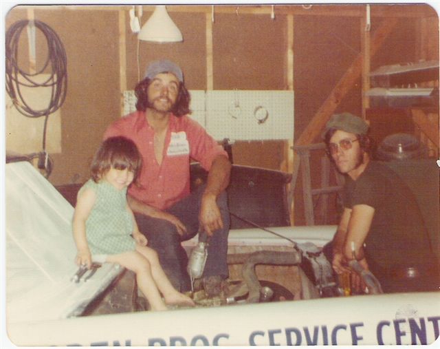 Phil and Christie working on a race car