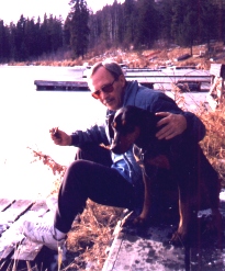 Mike and 'Quila at Burnstick Lake, relaxing in the sunshine.