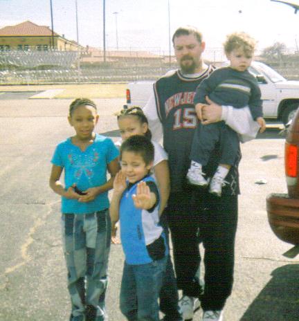Mikey with his dad, sisters and brother after we visited his uncle.
