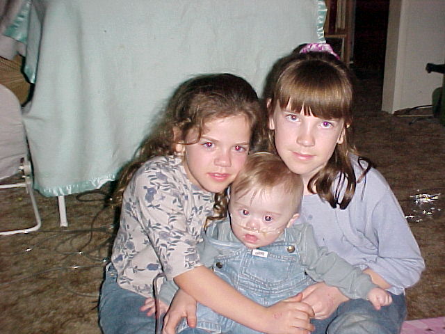 Skyler with his big sisters Chloe and Candice~feb 2000