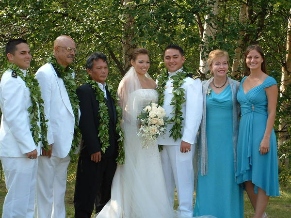 The lovely young woman on the right is Angelique's daughter Liann at her boyfriend's brothers'  wedding in Aug. 2005